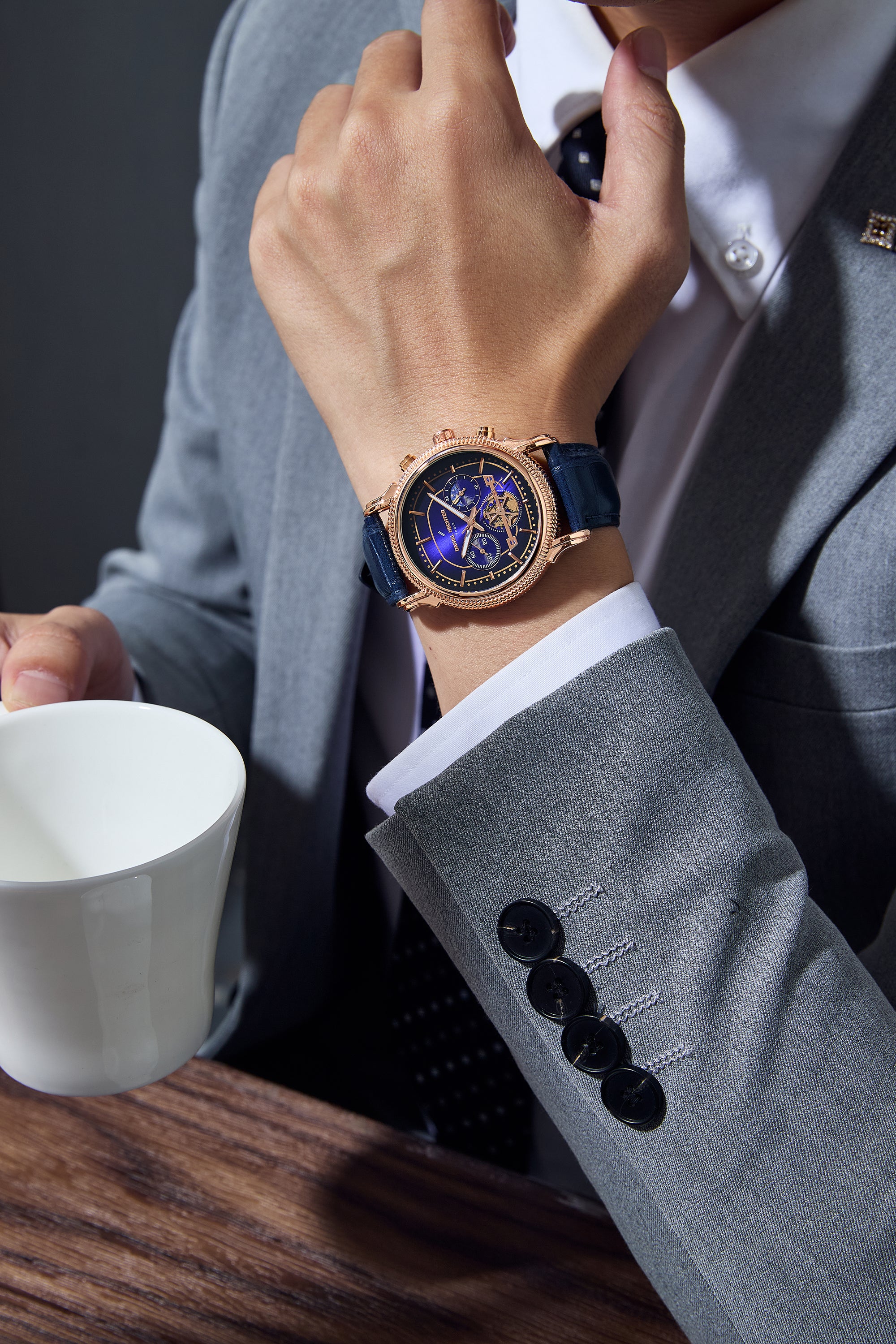 Daniel Hechter Paris Analog Quartz Watch for Men with Blue Round Dial, Day/Night Indicator, Small Seconds Sub-Dials and Blue Leather Strap - DHM1054-02