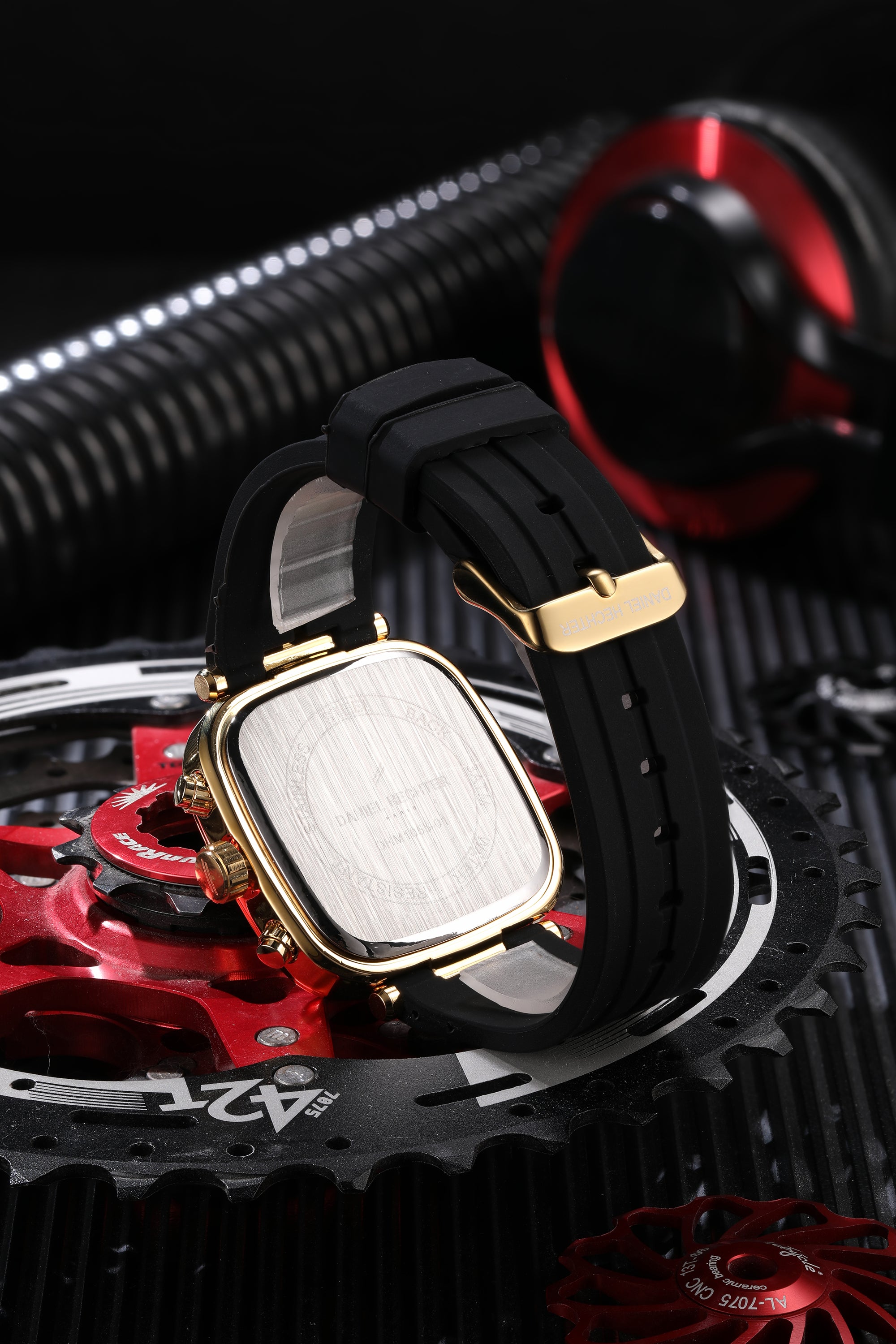 Daniel Hechter Paris Chronograph Analog Quartz Watch for Men with Black/Gold Square Dial, Luminous Hands & Baton Hour Markers and Black Silicone Strap - DHM1055-01